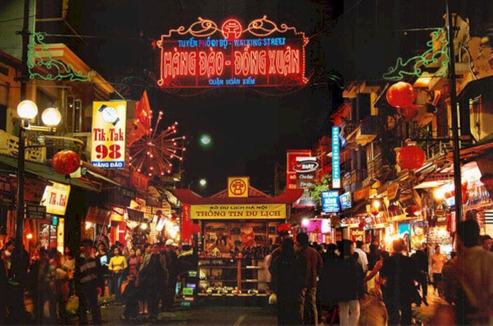 Hanoi Weekend Night Market &ndash; a lively shopping street with food stalls, souvenirs, and cultural performances in the Old Quarter
